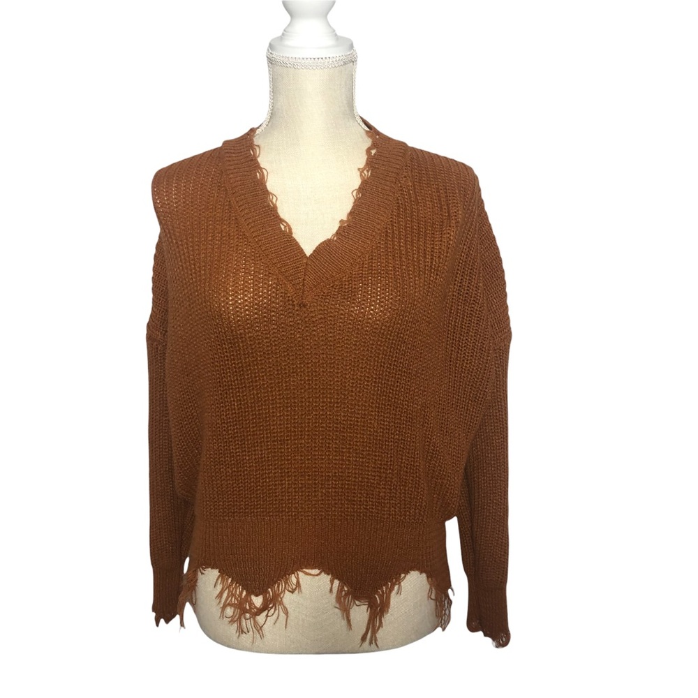 Rust Brown colored long sleeve v-neck knit sweater with frayed ends